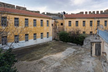 The Heptapyrgion or Yedikule (Seven Towers), a former fortress, later a prison and now a museum in Thessaloniki, Greece. View of the internal buildings of the prison. clipart