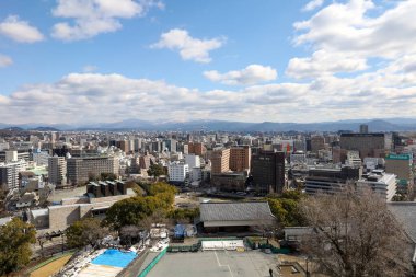 Kumamoto, Japan - January 25, 2023: Landscape of Kumamoto city from Kumamoto castle. Kumamoto is the capital city in Kyushu, Japan.