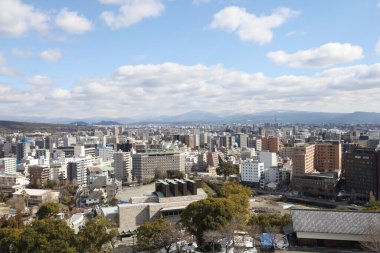 Kumamoto, Japan - January 25, 2023: Landscape of Kumamoto city from Kumamoto castle. Kumamoto is the capital city in Kyushu, Japan.
