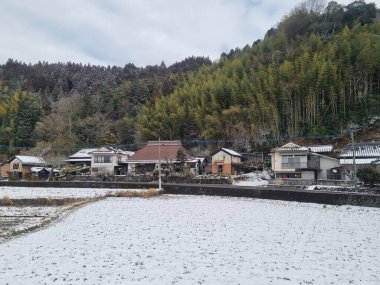 View of landscape Yufuin village in the winter after snow fall