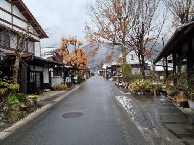 Yufuin,Japan - January 5,2023 : The vintage shopping on main street of Yufuin after snow fall in winter 