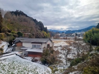 View of landscape Yufuin village in the winter after snow fall 