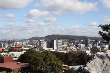 Kumamoto, Japan - January 25, 2023: Landscape of Kumamoto city from Kumamoto castle. Kumamoto is the capital city in Kyushu, Japan.