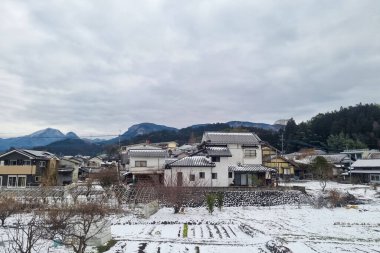 View of landscape Yufuin village in the winter after snow fall