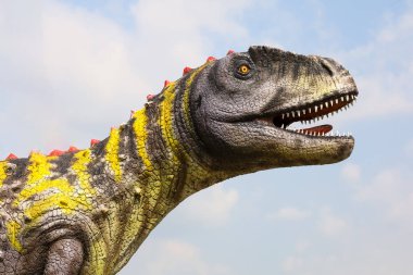 Pattaya, Tayland-28 Ocak 2022: Dinazor heykeli Nong Nooch Tropik Botanik Bahçesi 'nde tatil için çok güzeldir