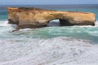 View of landscape and seascape the london bridge location is beautiful good view point at great ocean road australia clipart