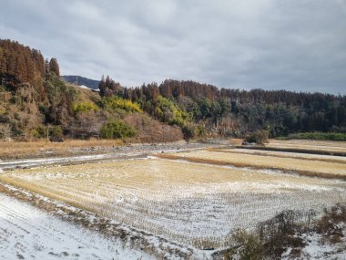 View of landscape Yufuin village in the winter after snow fall clipart