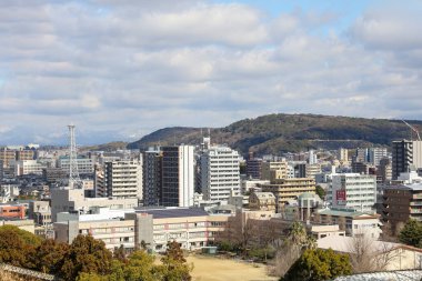Kumamoto, Japan - January 25, 2023: Landscape of Kumamoto city from Kumamoto castle. Kumamoto is the capital city in Kyushu, Japan.