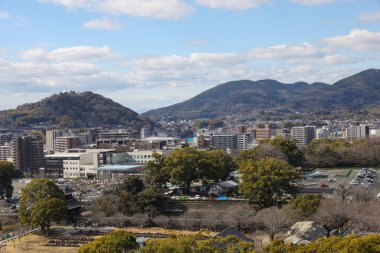 Kumamoto, Japan - January 25, 2023: Landscape of Kumamoto city from Kumamoto castle. Kumamoto is the capital city in Kyushu, Japan.