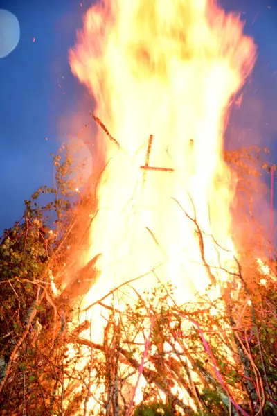 stock image Large Midsummer bonfire at night in Latvia. Burning bonfire with dark background