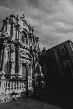 Saint Agatha Cathedral in Catania, Italy, in black and white. A popular place of sightseeing on Sicily. clipart