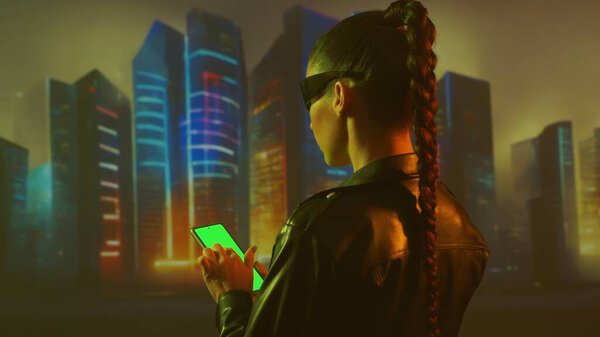 Portrait of cyberpunk girl. Beautiful young woman on the background of city scyscrapers. Futuristic concept.