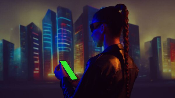Portrait of cyberpunk girl. Beautiful young woman on the background of city scyscrapers. Futuristic concept.