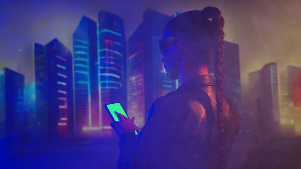 Portrait of cyberpunk girl. Beautiful young woman on the background of city scyscrapers. Futuristic concept.