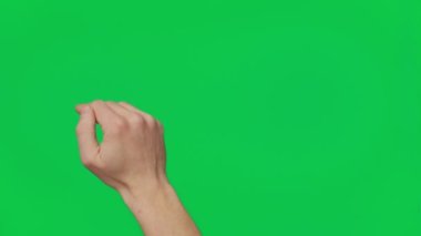 Male hand touching, clicking, tapping, sliding and swiping on chroma key green screen background. Different signs and gestures with fingers. Gestures pack. Using a smartphone, tablet or a touchscreen