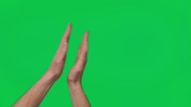 Male hand touching, clicking, tapping, sliding and swiping on chroma key green screen background. Different signs and gestures with fingers. Gestures pack. Using a smartphone, tablet or a touchscreen