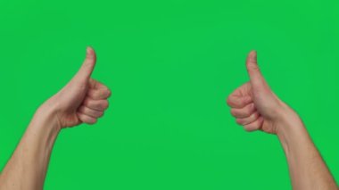 Mans hand shows gestures and signs of success on a chroma key green screen background. Thumb up. Gesture package. The concept of success, consent and approval. Template 4K.