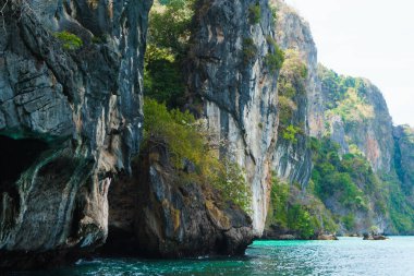 Beautiful aea lagoon and green rock in Thailand. Traveling and vacation concept.