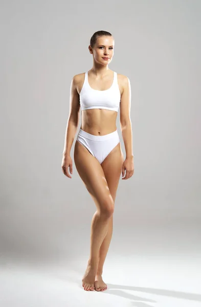 Young Fit Beautiful Blond Woman White Swimsuit Isolated Grey Background — ストック写真
