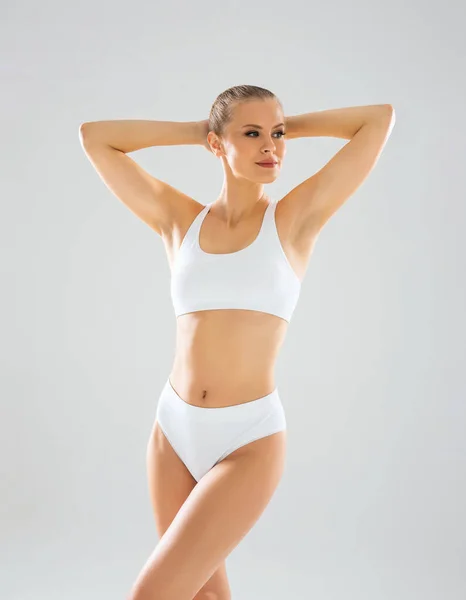 Young Fit Beautiful Blond Woman White Swimsuit Isolated Grey Background — ストック写真