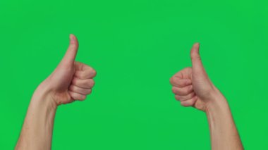 Mans hand shows gestures and signs of success on a chroma key green screen background. Thumb up. Gesture package. The concept of success, consent and approval. Template 4K.