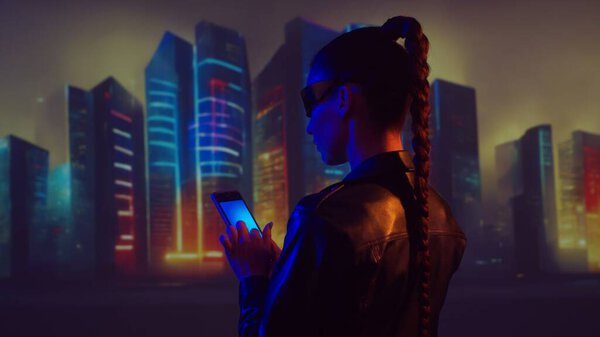Portrait of cyberpunk girl. Beautiful young woman on the background of city scyscrapers. Futuristic concept.