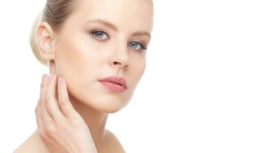 Close-up portrait of beautiful, fresh, healthy and sensual girl over isolated white background