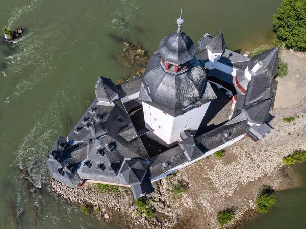 stock image Kaub, Germany - 20 July 2024: drone view at Pfalzgrafenstein water fort on river Rhine at Kaub in Germany