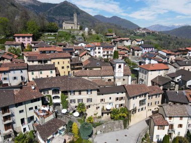 Drone view at the village of Miglieglia on Maltancone valley in the swiss alps clipart