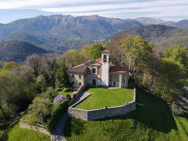 stock image Drone view at the church of Santa Maria over Iseo on Malcantone valley in the swiss alps