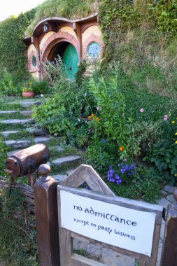 Matamata, New Zealand - 19 January 2025: Hobbit house on the Hobbiton movie set on New Zealand clipart