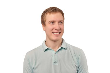 Portrait of funny young guy in light grey Polo T-shirt isolated on white background. Attractive smiling man with goodwill emotions, handsome happy facial expression, casual style