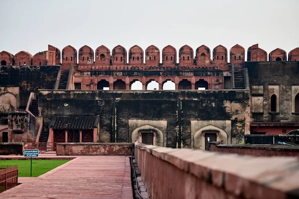 stock image Walls of Agra red fort in India from inside, view from main entrance Amar Singh Gate to beautiful ancient building, red fort in Agra built of red sandstone, Lal Qila historical ancient building