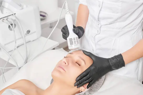 Beautician Makes Cryotherapy Rejuvenation Woman Face Aging Cosmetic Procedure Beauty Stock Photo