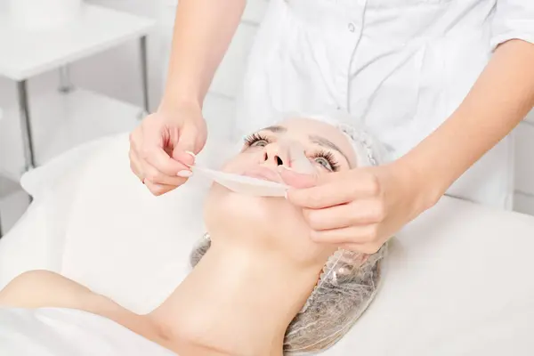 Beautician Removing Sheet Mask Woman Face Rehydrate Face Skin Aging — Stock Photo, Image