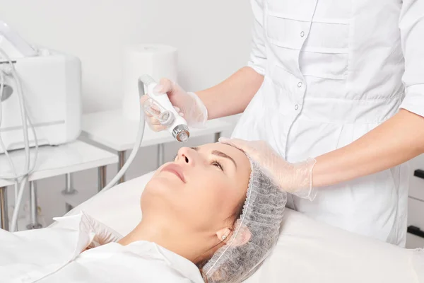 Beautician Makes Facial Gas Liquid Oxygen Serum Epidermal Peeling Rejuvenation Stock Picture