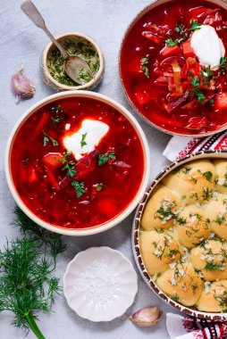 Traditional Ukrainian pampushki with borsch .style rustic.top veiw.selective focus clipart