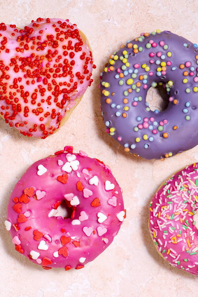Valentine's Day Decorated Donut Assortmenttop veiw . selective focus