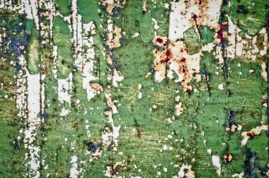 Grunge dokusu örtüşüyor. Çatlak boyalı paslı metal doku. Metal yüzeyde yıpranmış boya. Doku arkaplanını kapat.