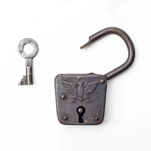 Rustic Padlock Adorned Eagle Emblem Paired Its Key Lock Aged — Stock Photo, Image