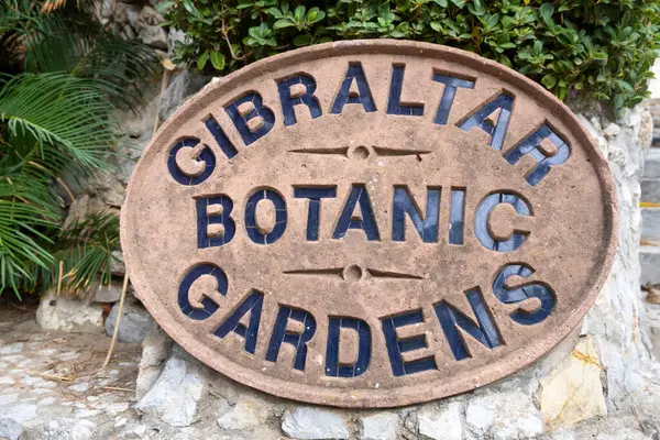 stock image Large oval shaped sign at the entrance of the Gibraltar Botanic Gardens, which is also known as The Alameda Gardens.