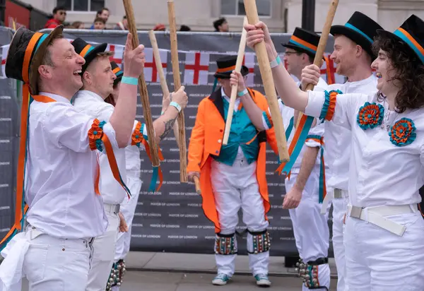 stock image London, UK. 21st April 2024. The Bower Street Morris Dancers from Margate, performing at the annual Mayor of London's St. George's Day Celebration in Trafalgar Square, London.