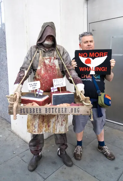 stock image London, UK. 22nd June 2024. Anti-whaling environmental protesters at the Restore Nature Now protest demonstration in London, calling for urgent political action on the nature and climate emergencies.