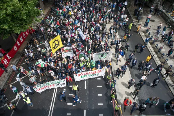 stock image London, UK. 6th July 2024. Pro Palestine supporters at the National March for Palestine demonstration, London, demanding the government End The Genocide, Stop Arming Israel and Justice for Palestine.