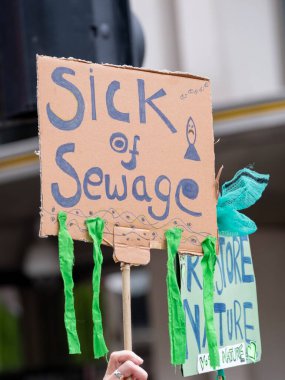 London, UK. 22nd June 2024. Protest signs and placards seen at the Restore Nature Now protest demonstration in London, calling for urgent political action on the nature and climate emergencies. clipart