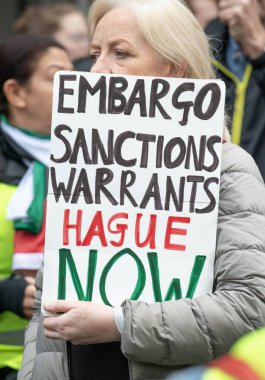 London, UK. 2nd Nov 2024. Pro Palestine supporter holding sign at the National March for Palestine protest, London, demanding Justice for Palestine and for the government to help end the fighting. clipart