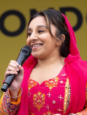 London UK.  6th April 2024. Shani Dhanda presenting at the Vaisakhi Festival in Trafalgar Square, the event celebrating Sikh culture and the traditional spring harvest in the Sikh calendar. clipart