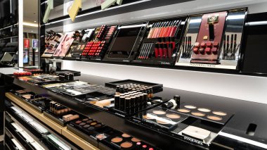 NEW YORK - MARCH, 2020: Beauty products for make up by Chanel. Chanel is a high fashion house specialized in women's haute couture clothes, luxury goods, and fashion, and accessories. clipart