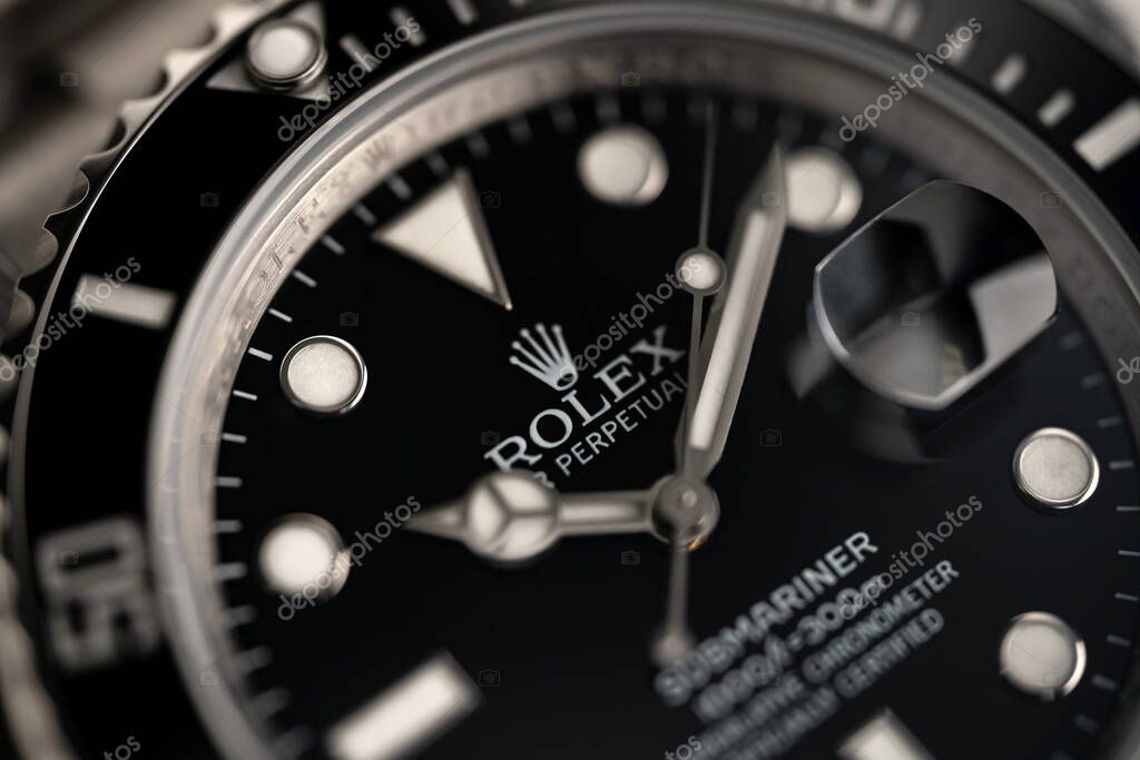 BOLOGNA, ITALY - MARCH, 2020: Rolex Submariner watch close up, shallow depth of field. Rolex SA is a Swiss luxury watchmaker, founded in London, England in 1905. Illustrative editorial.