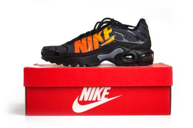 BOLOGNA, ITALY - SEPTEMBER, 2018: Brand new Nike Air Max Plus TN sport shoes. Nike is one of the world's largest suppliers of athletic shoes. The company was founded in 1964. Illustrative editorial. clipart